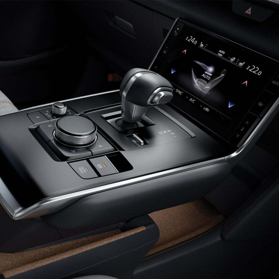 The floating console with access to various vehicle functions, together with the touch screen climate control.