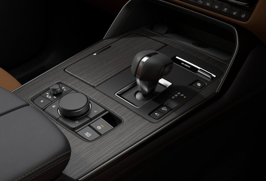 The elegant centre console is designed with intention — placing essential controls within natural reach. Premium materials and meticulous detailing elevate your sense of control.