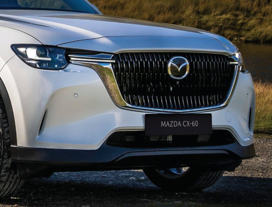 The Mazda CX-60’s bold front grille commands attention with its sleek, modern design. The contours enhance the SUV’s premium aesthetic while optimising airflow, reflecting Mazda’s commitment to both elegance and performance.