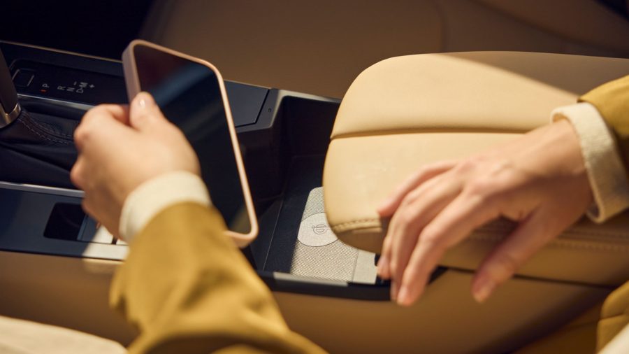 The Qi wireless charger keeps your smartphone powered without the clutter, blending everyday convenience seamlessly into the clean design of the centre console.
