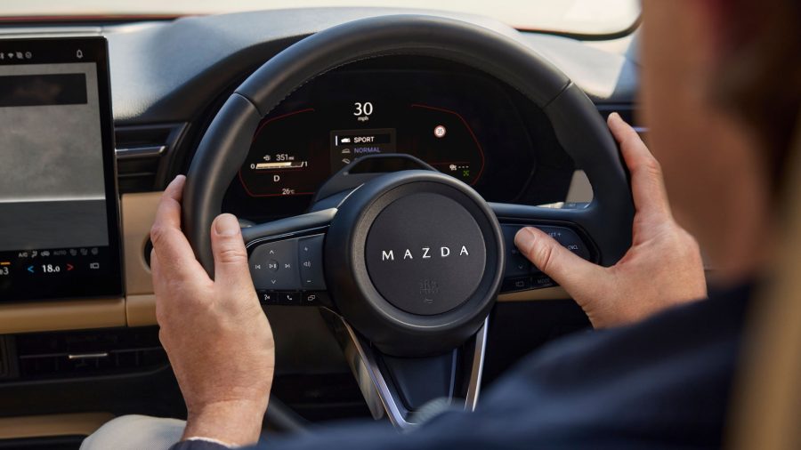 The Capacitive Steering Wheel Switches bring frequently used functions closer to hand, allowing intuitive swipe and flick control of Mi-Drive, 360° View Monitor, meter cluster, safety settings and media while keeping your hands on the wheel.